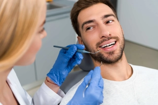 Limpieza dental simple gratuita para el titular o un beneficiario*